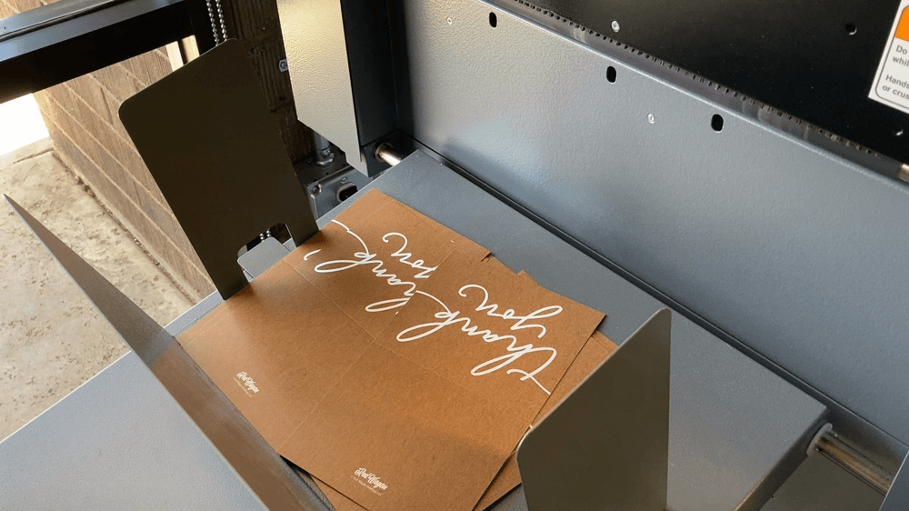 handwrytten cards being cut