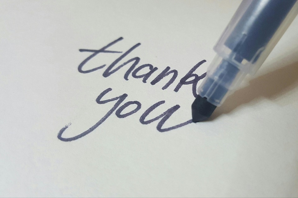 picture of the words thank you with a marker on top of it