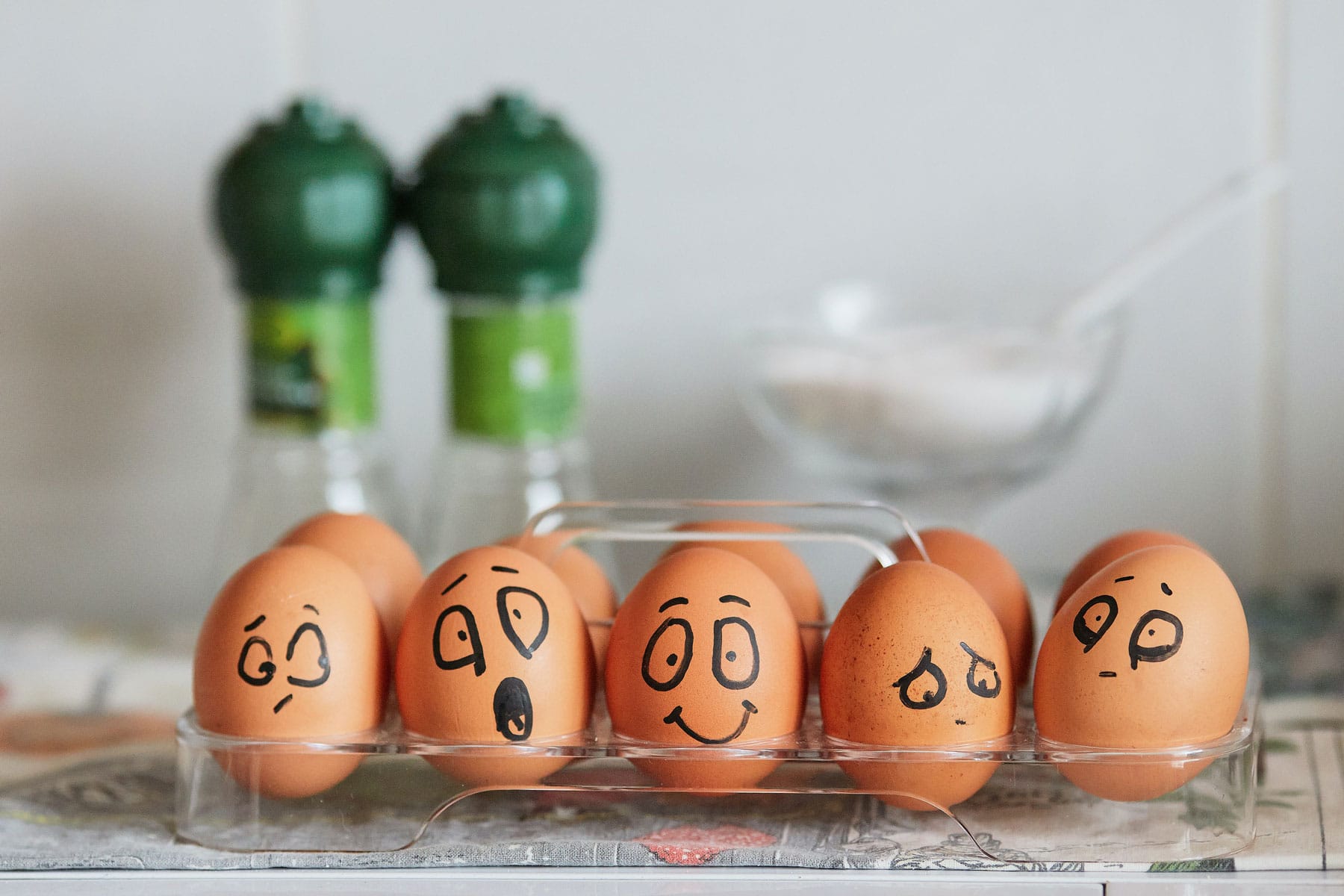 Eggs with various expressive faces.