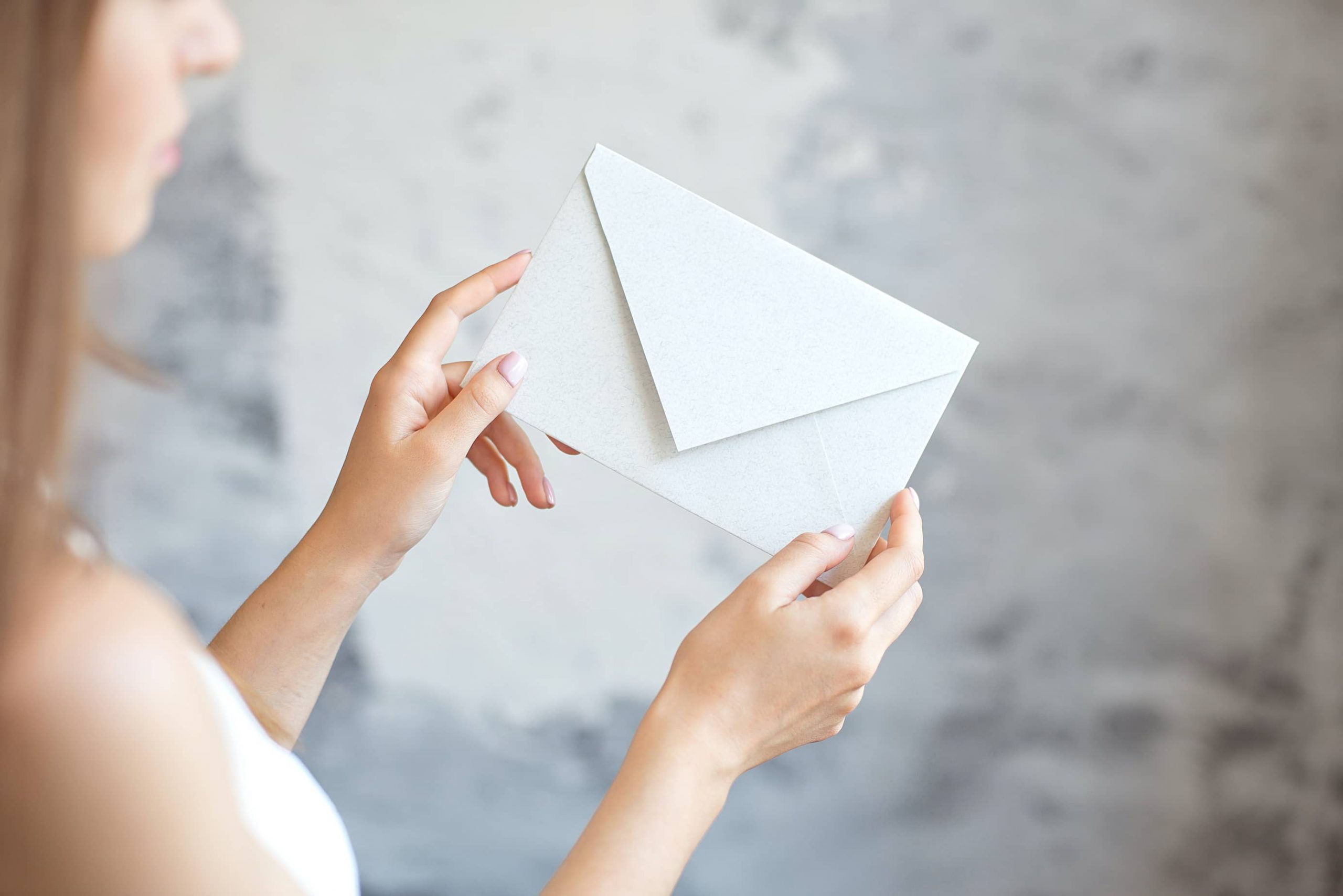 woman holding envelope for customer