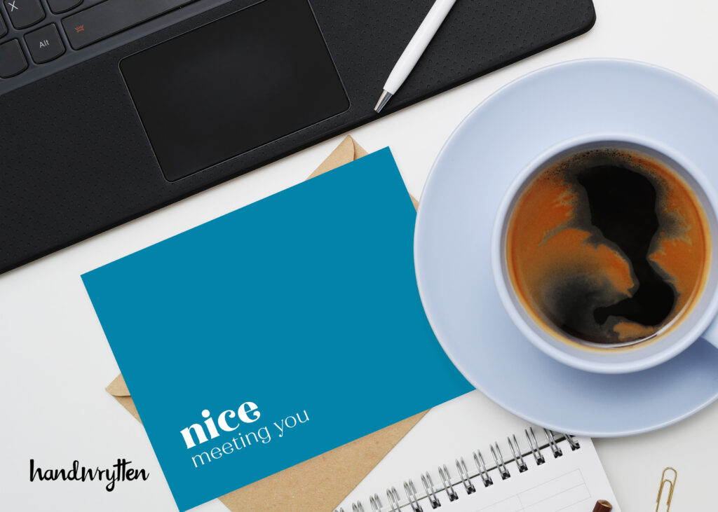 Coffee, notebook, and greeting card.