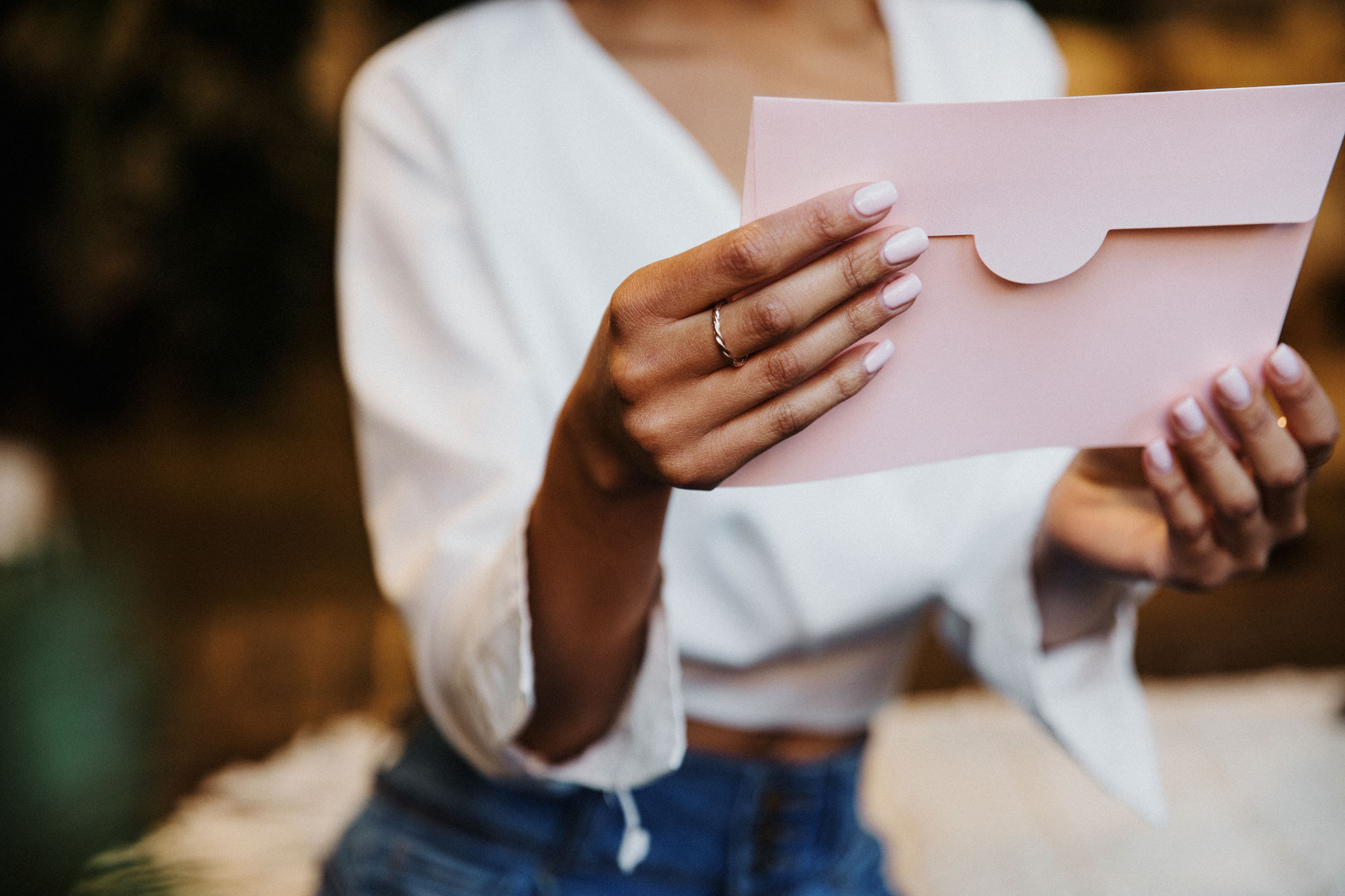 woman reading handwritten card